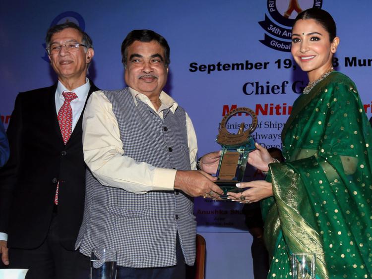 Anushka Sharma receiving award